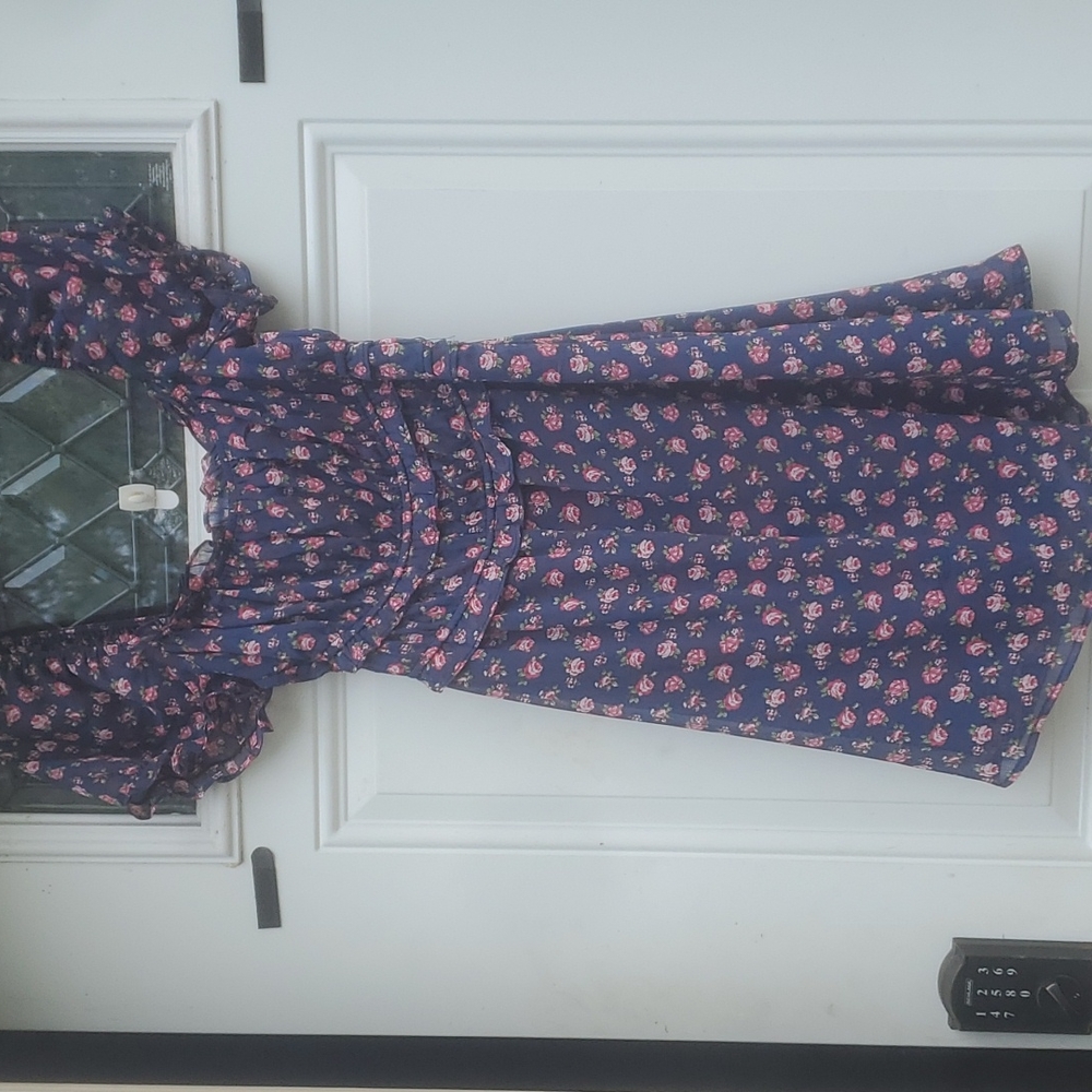 A navy blue dress with flowers
